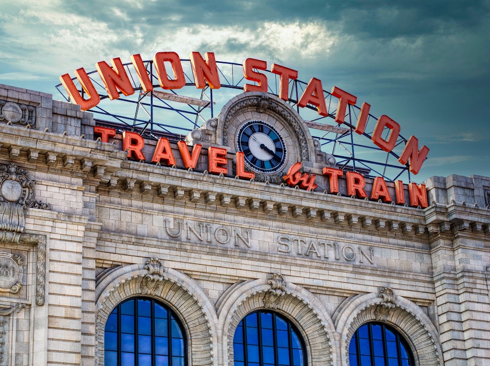 a train station with a clock on top of it