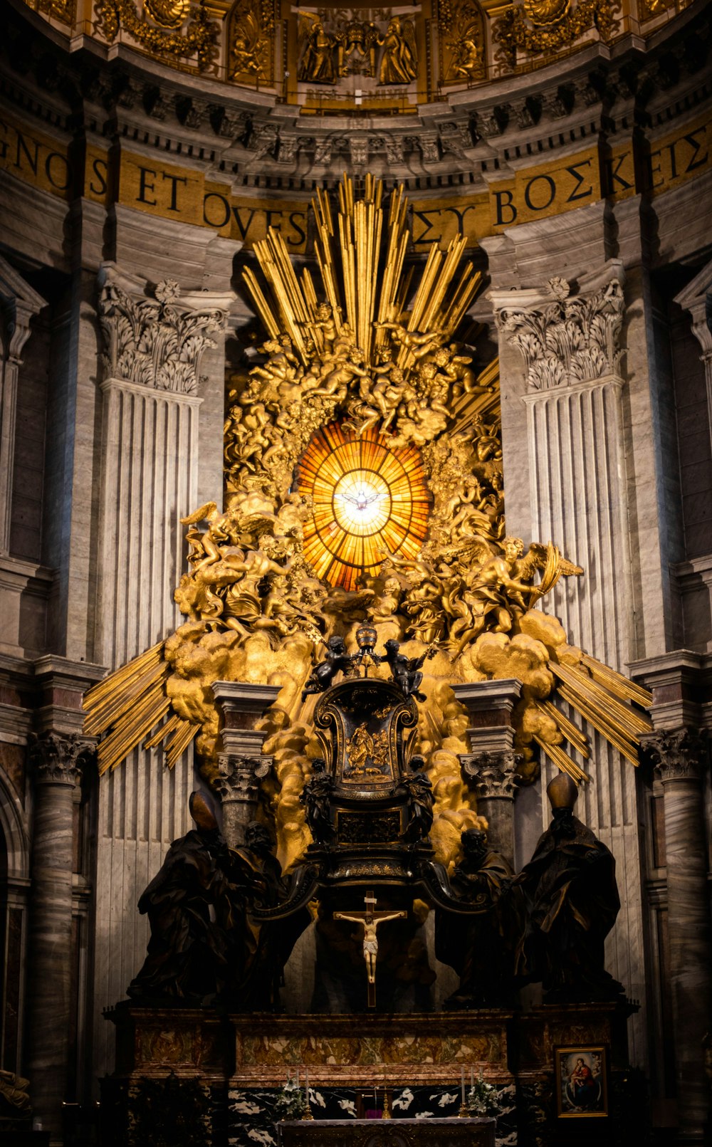 a statue of a cross in a church