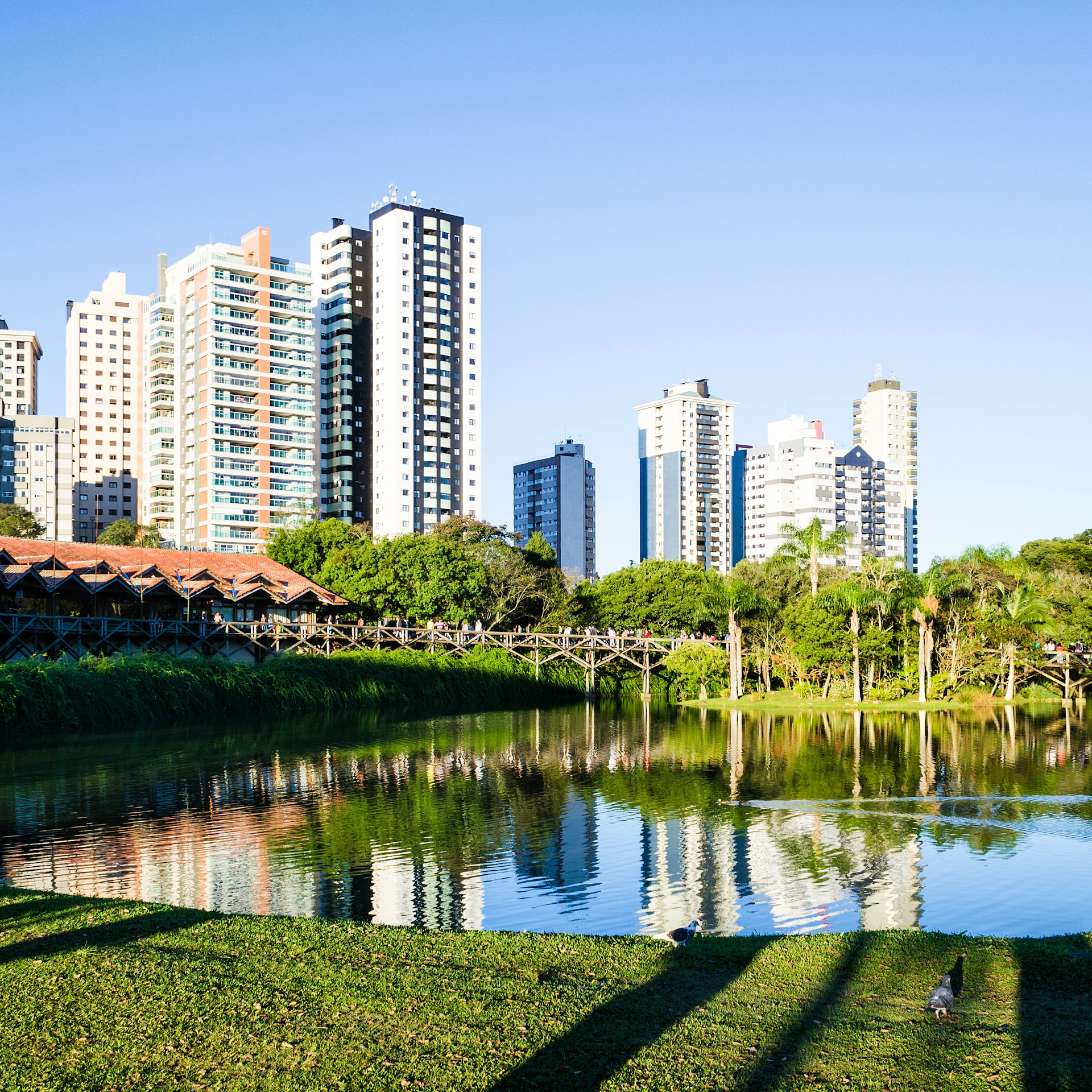 a body of water surrounded by tall buildings