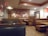 A cozy restaurant interior showcasing a warm and inviting ambiance.
