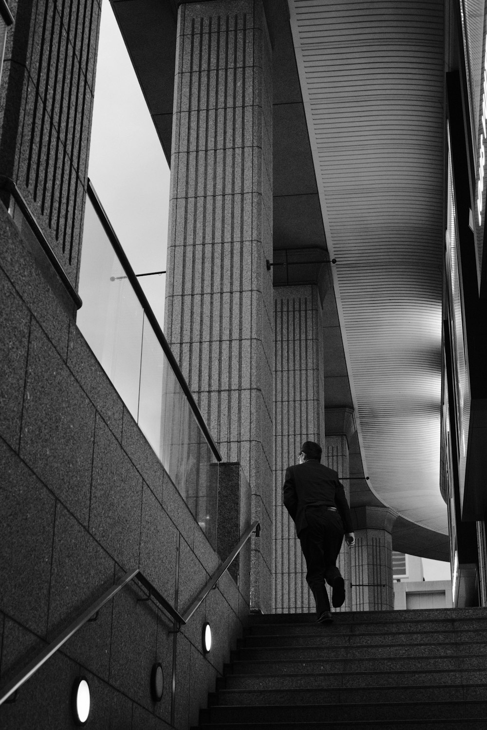 a man walking down a flight of stairs