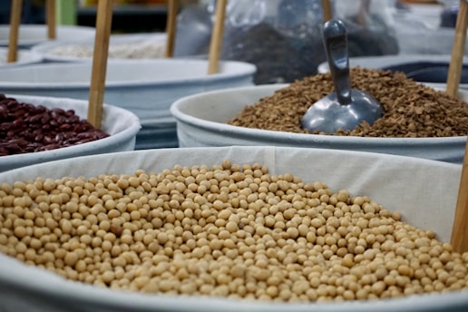 a bunch of bowls filled with different types of food