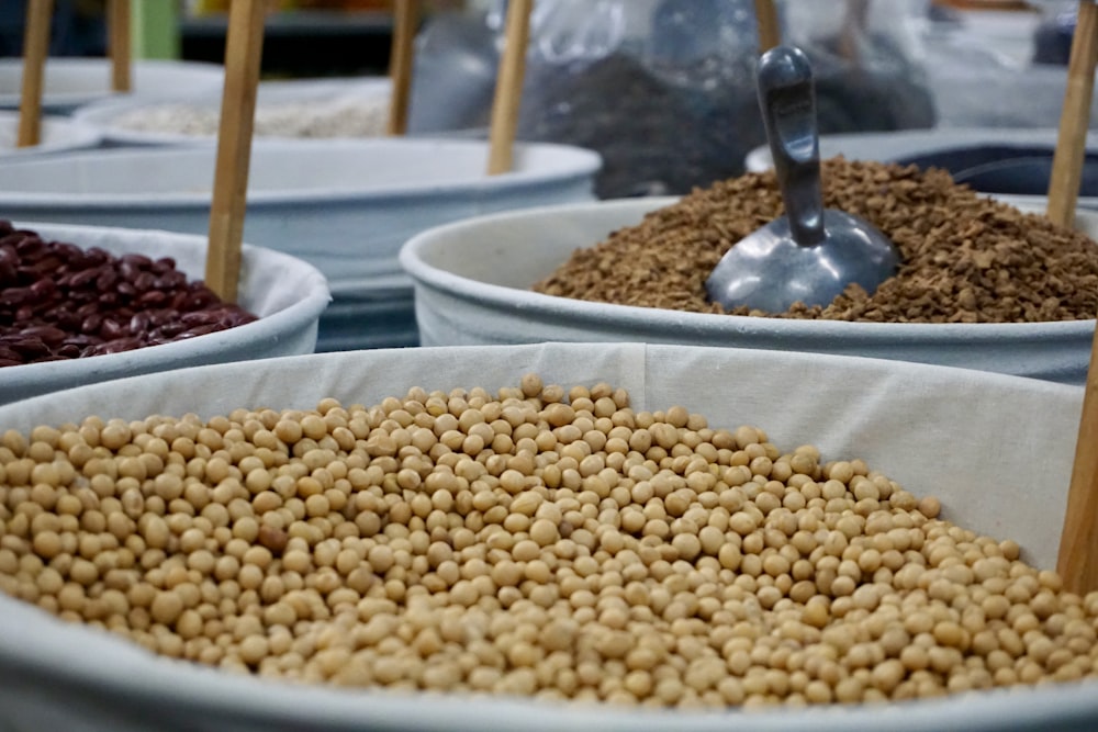 a bunch of bowls filled with different types of food