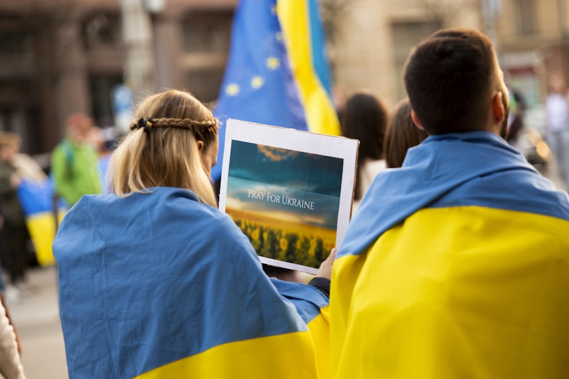 a couple of people that are standing in the street