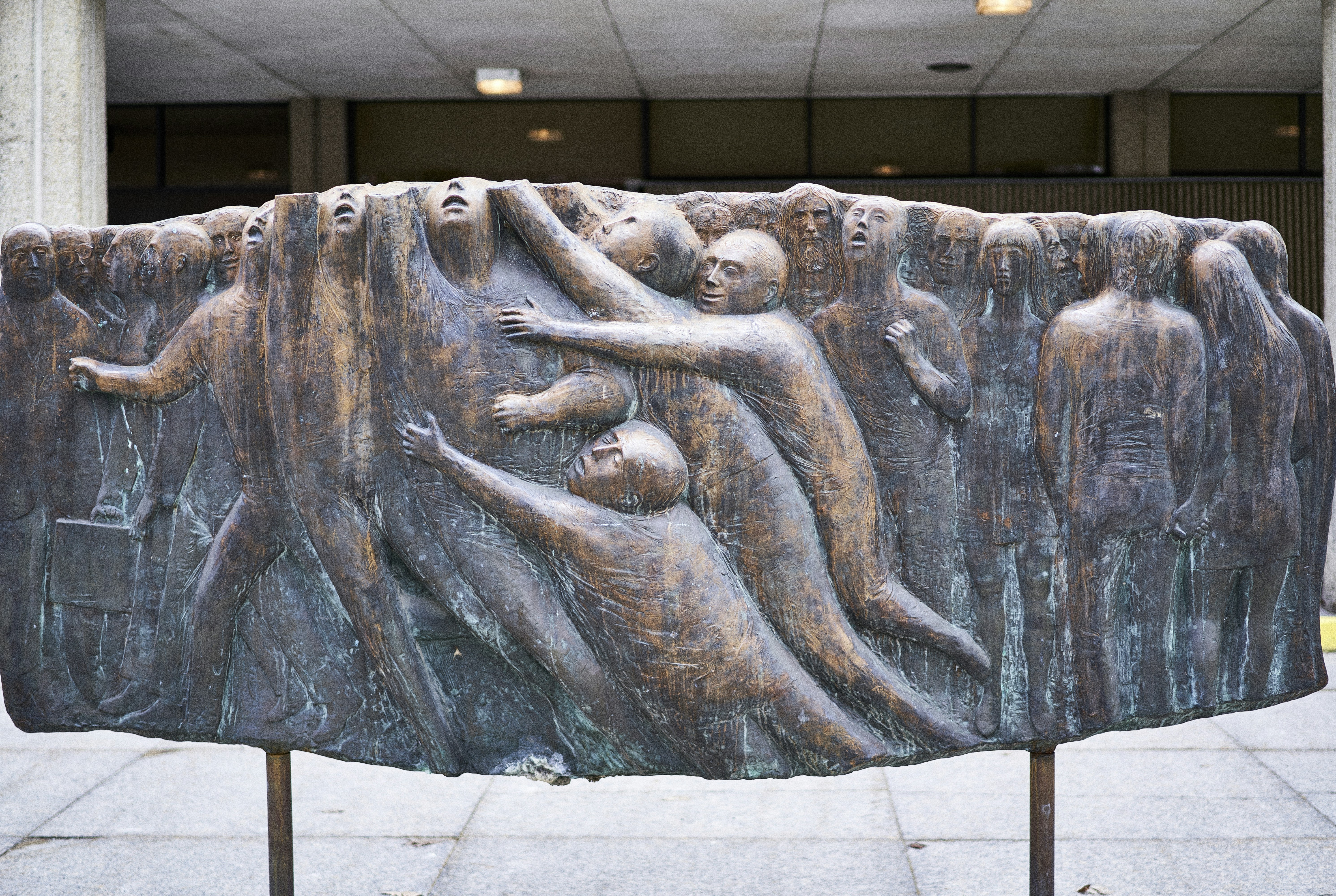 a sculpture of a woman holding a child