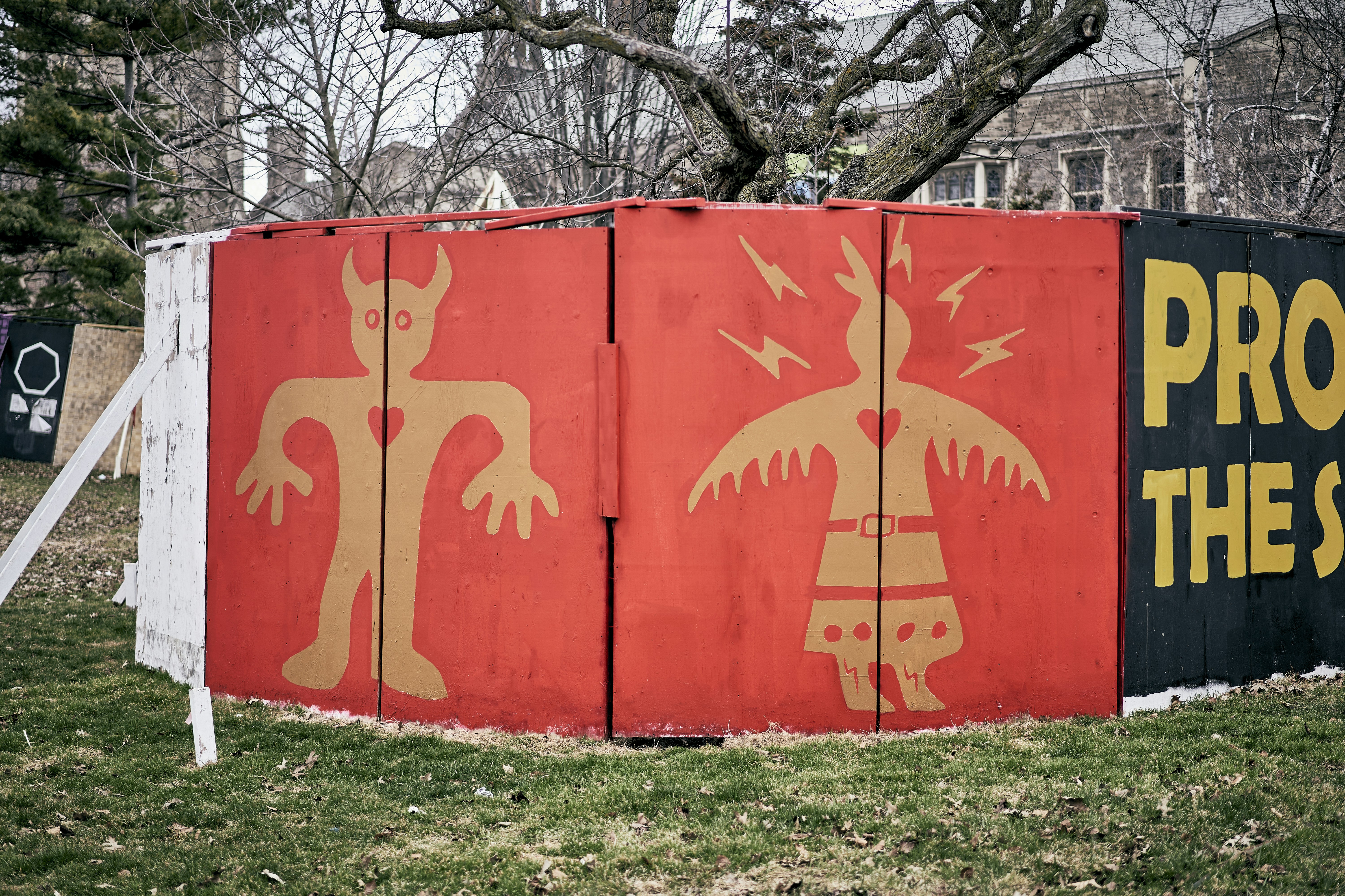 a red and black box with a painting on it