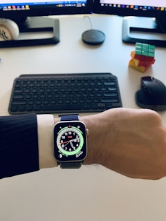 a person wearing a watch on their wrist