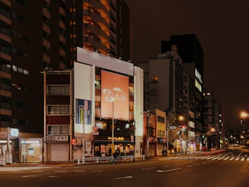 Hotel Siam International exterior at dusk with welcoming entrance lights.