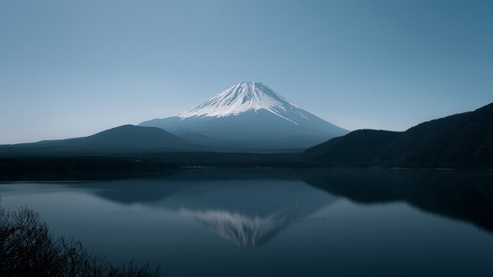 a mountain with a lake in front of it