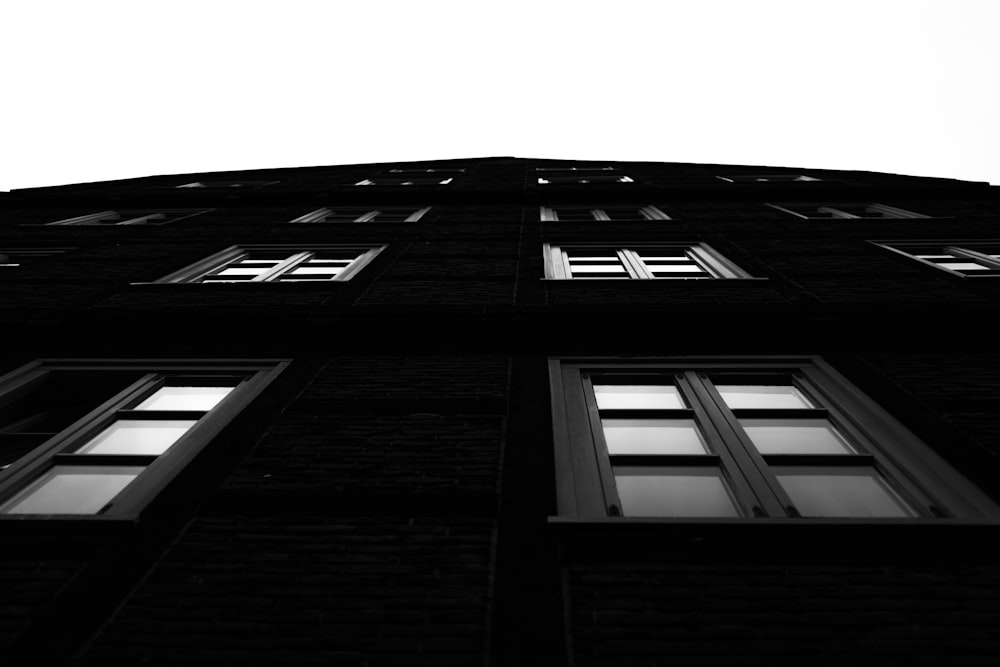 a black and white photo of a tall building