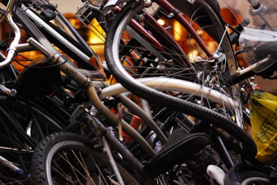 Assorted bike-themed candles arranged artfully with cycling gear in the background.
