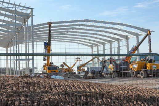 a construction site with a large amount of construction equipment