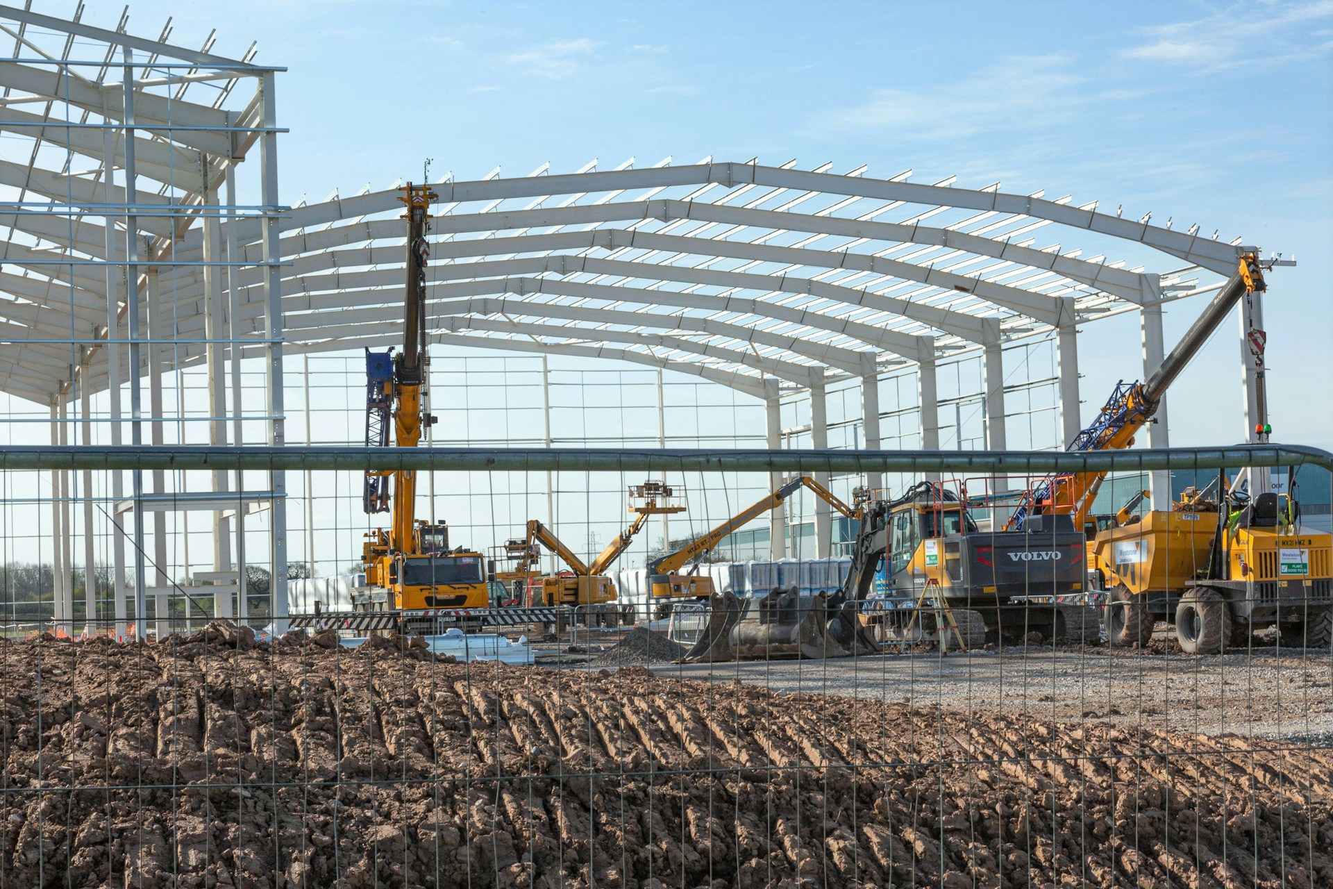 a construction site with a large amount of construction equipment