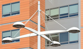 a street light in front of a tall building