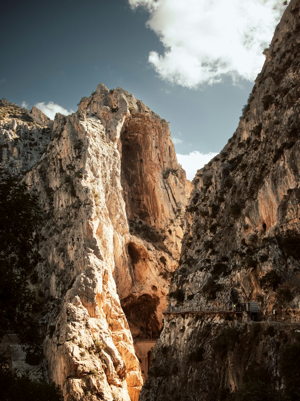 a mountain with a road going through it