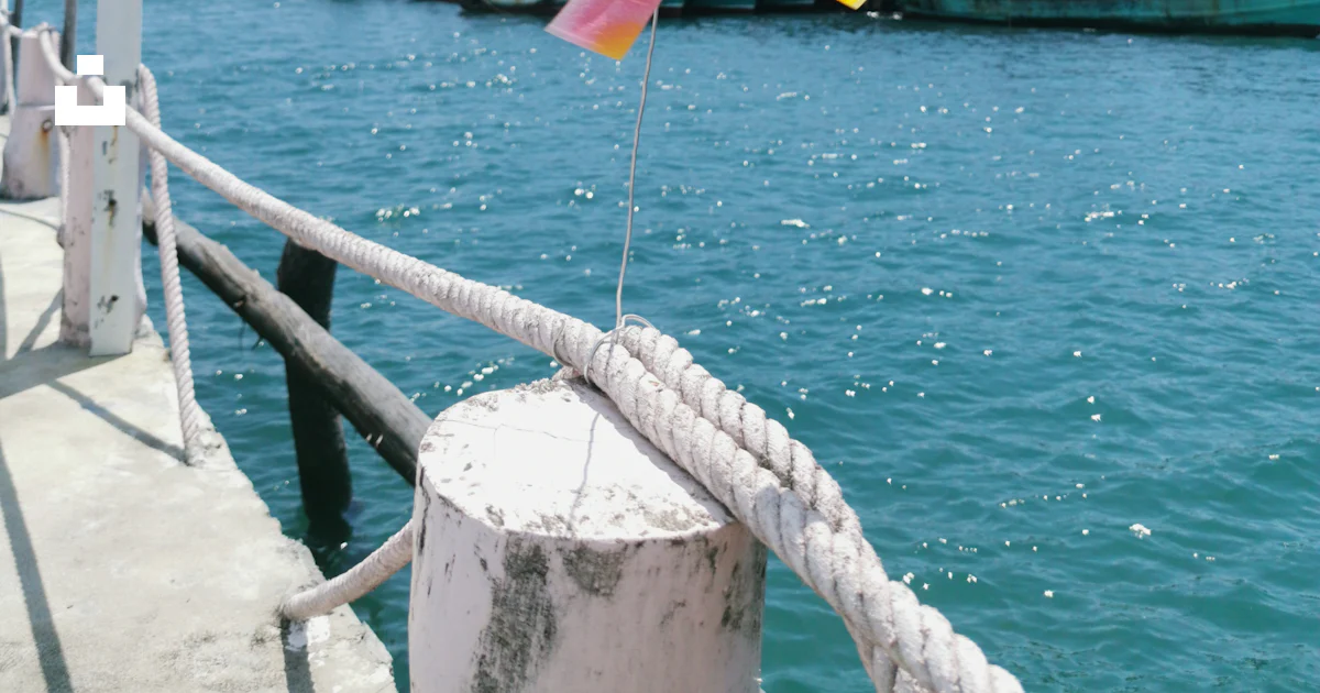 A colorful pinwheel on the side of a boat photo – Free Watercraft Image ...