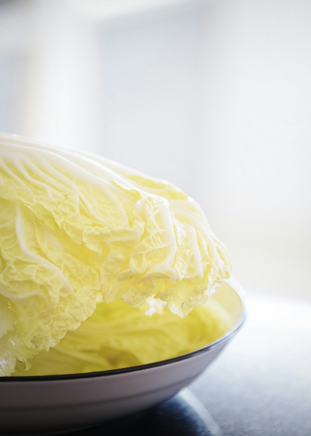 a close up of a bowl of food on a table