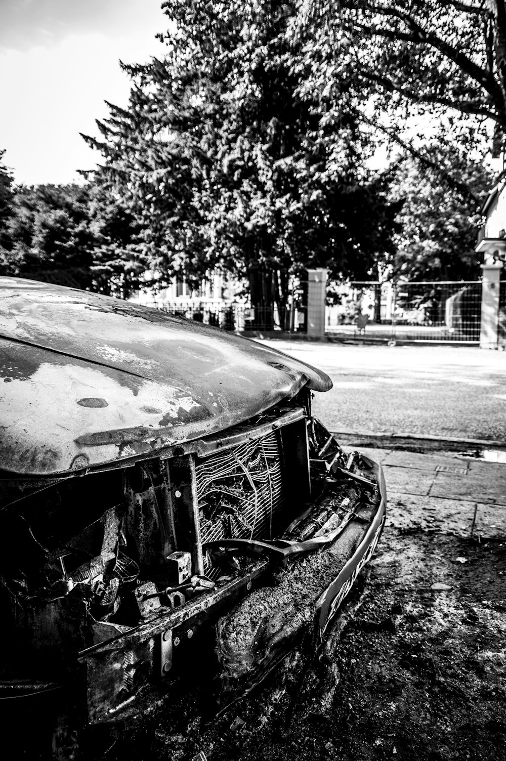 a car that is sitting in the dirt