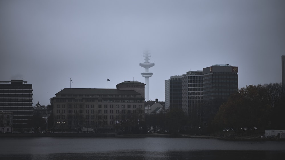 a view of a city with a tower in the background