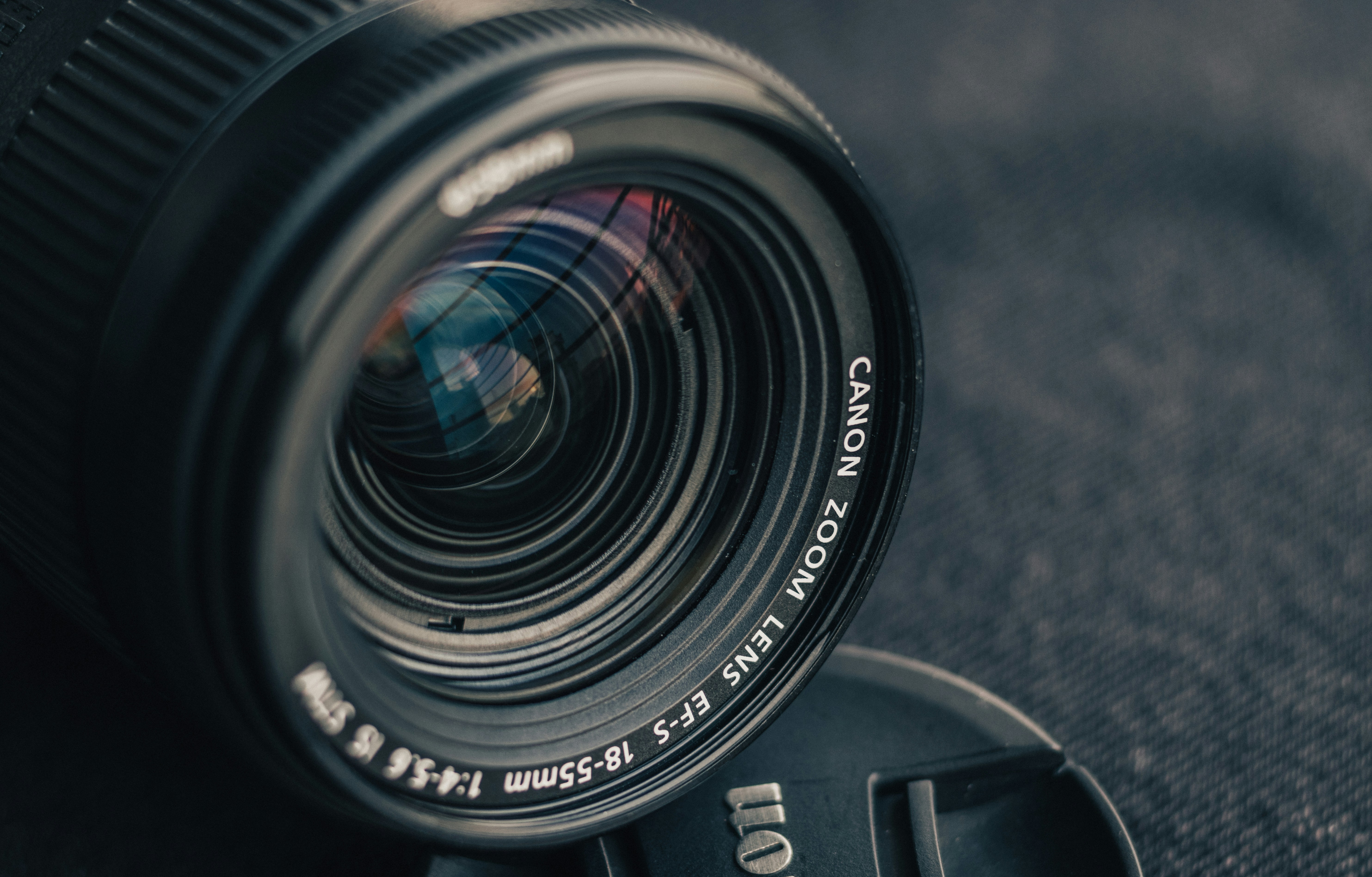 a camera lens sitting on top of a camera