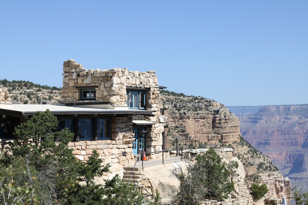 a house on the edge of a cliff
