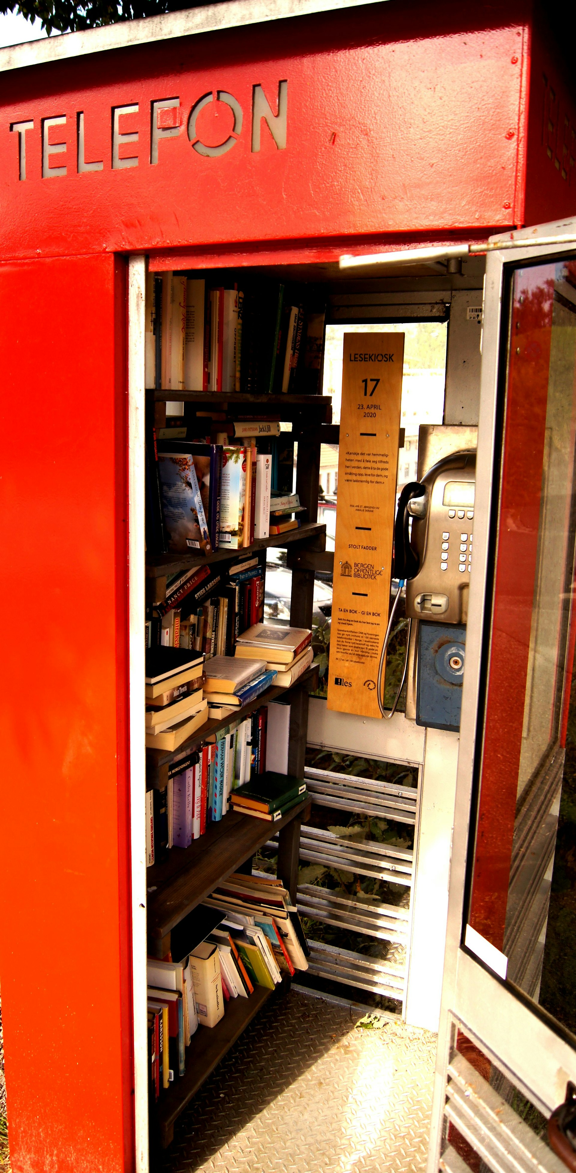 woman wearing yellow long-sleeved dress under white clouds and blue sky during daytime