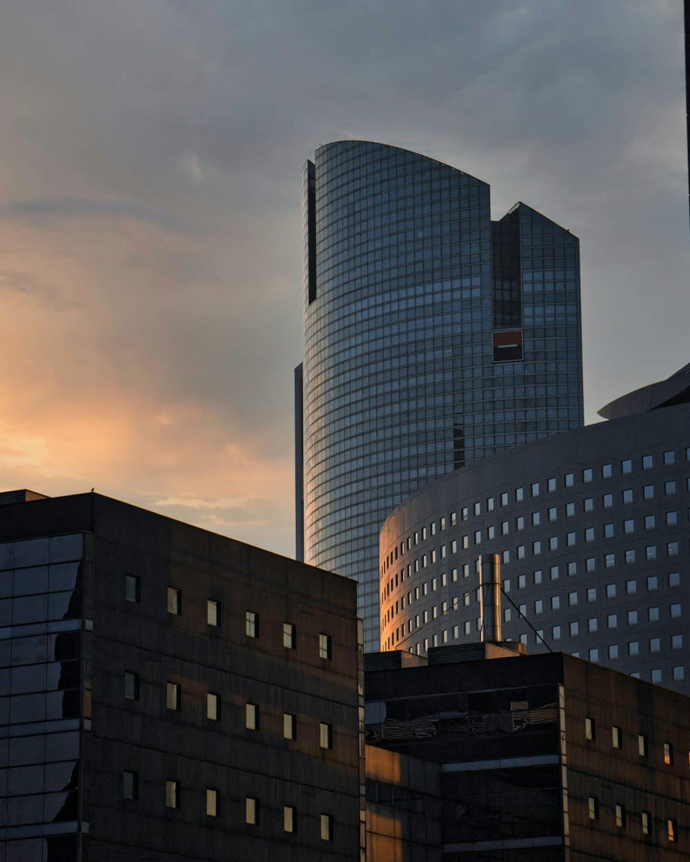 a view of a city skyline at sunset