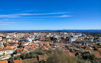 a view of a city from a hill