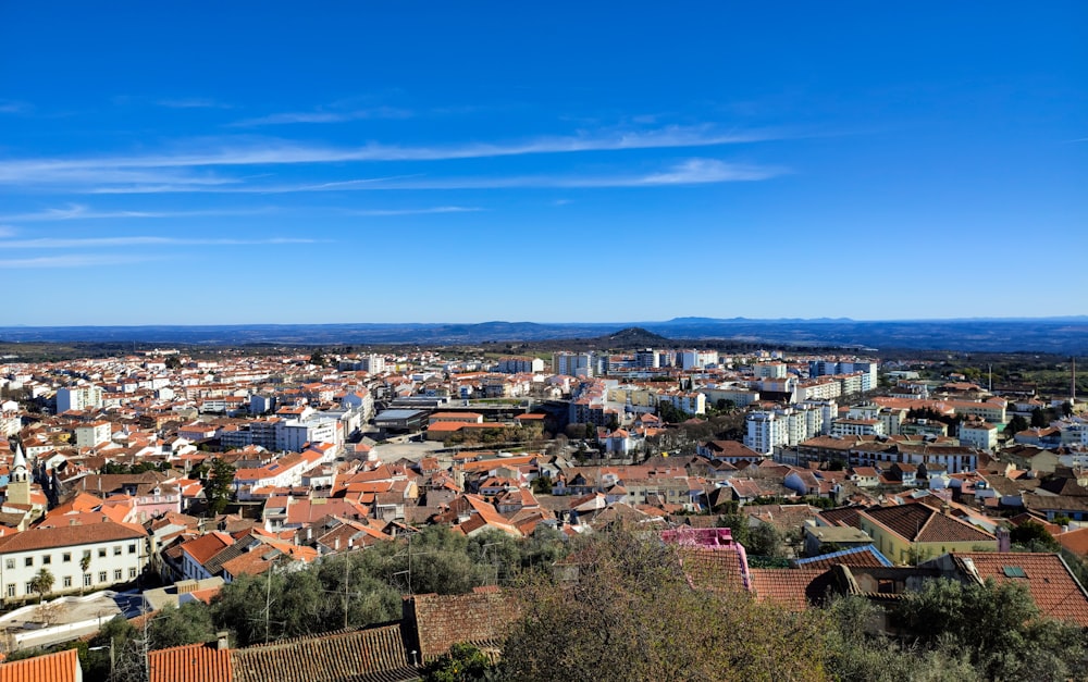 a view of a city from a hill