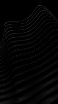 a black and white photo of wavy lines