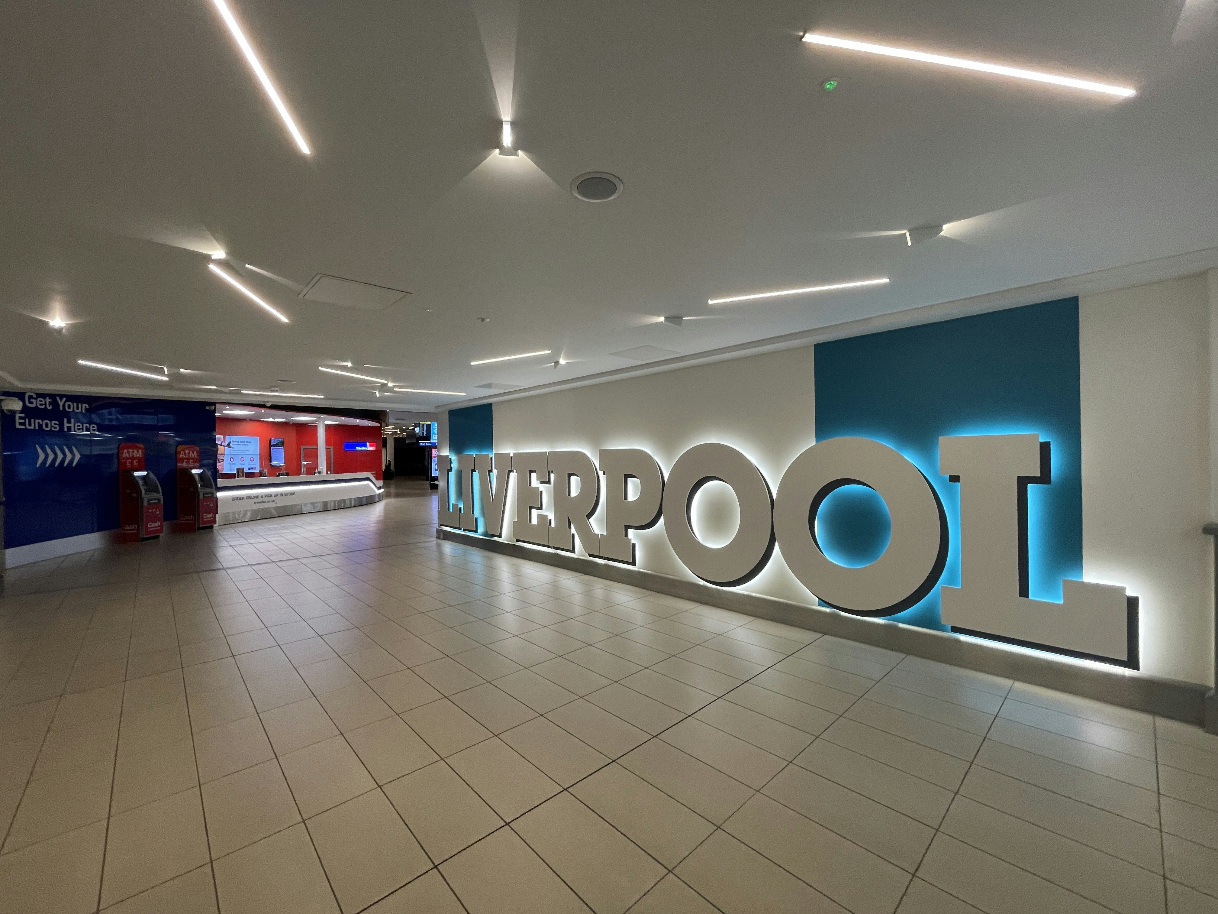 a lobby with a large sign that says liverpool, 
