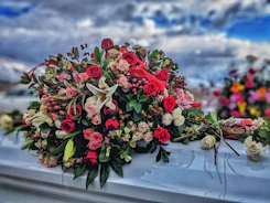 AI-generated floral arrangement representing a thoughtful funeral tribute