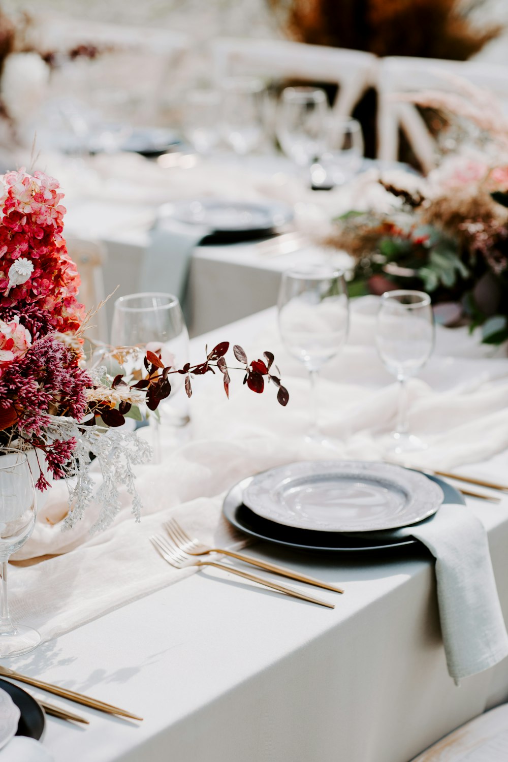 a table is set for a formal dinner