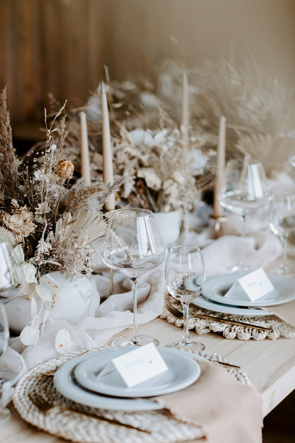 a table set with place settings and place settings