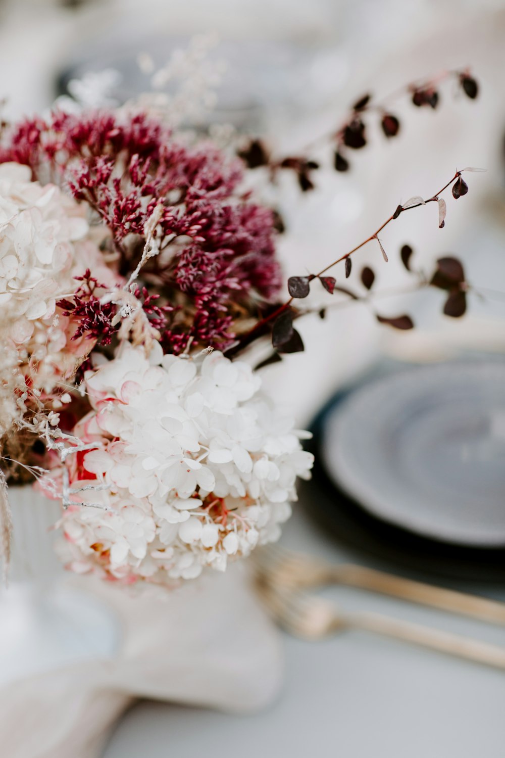 a bouquet of flowers sitting on top of a table