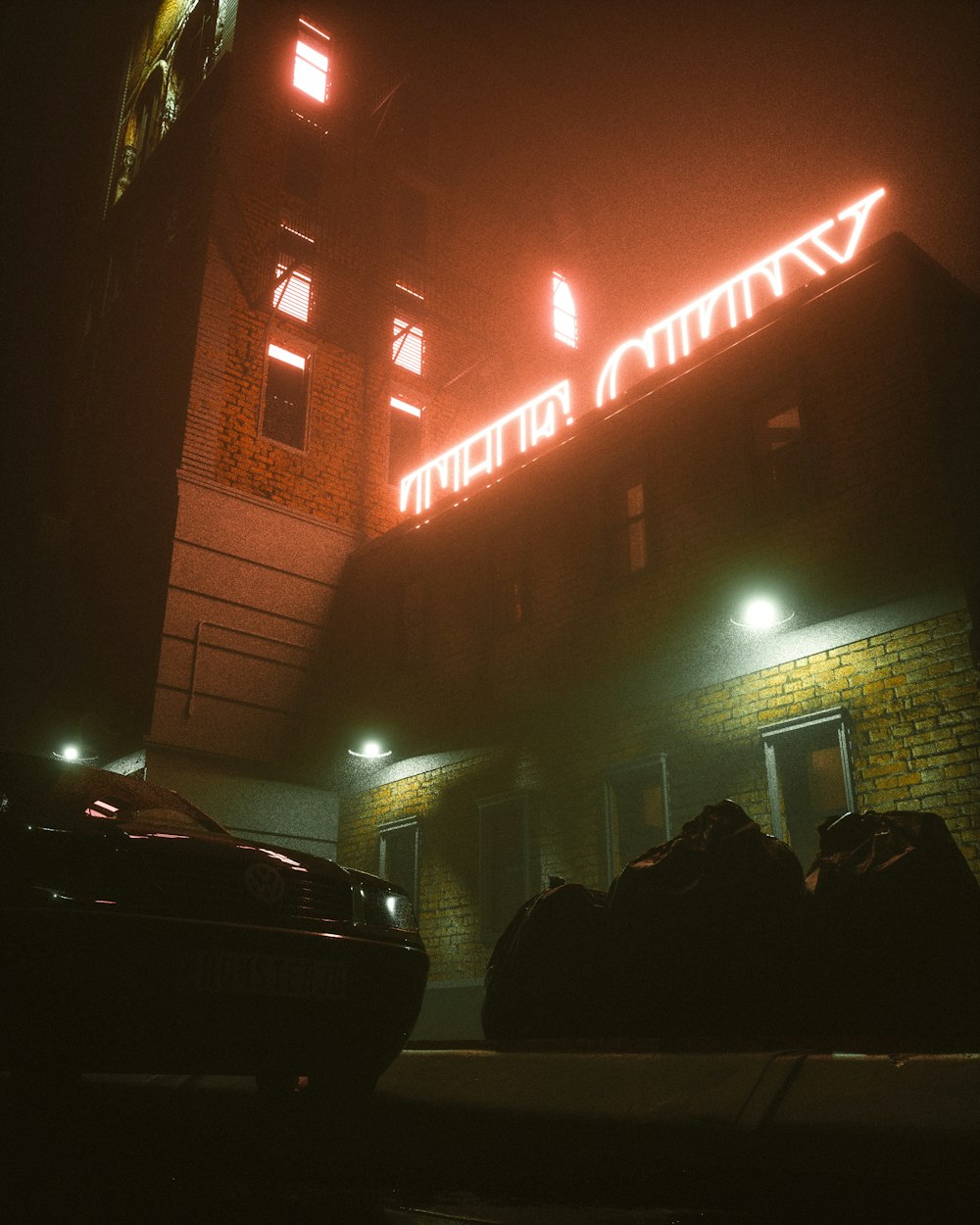 a car parked in front of a building at night