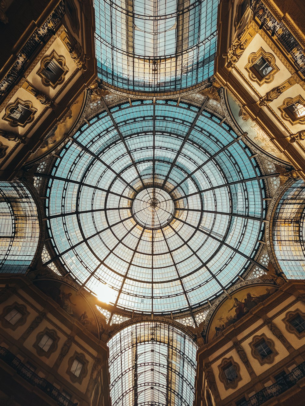 the ceiling of a building with a glass dome