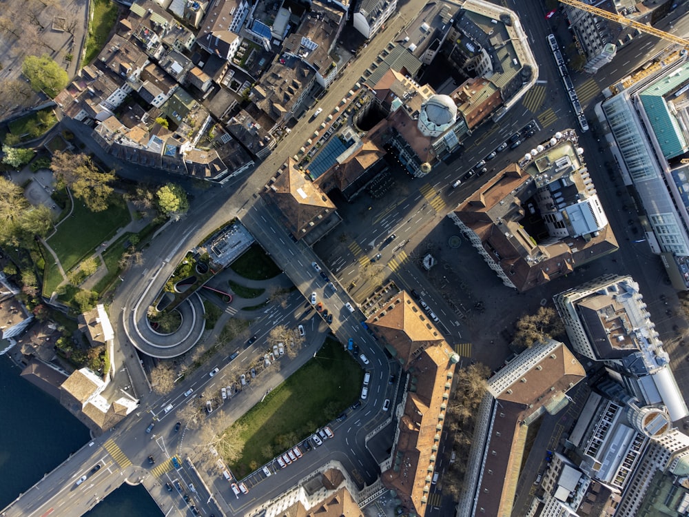 an aerial view of a city with lots of tall buildings