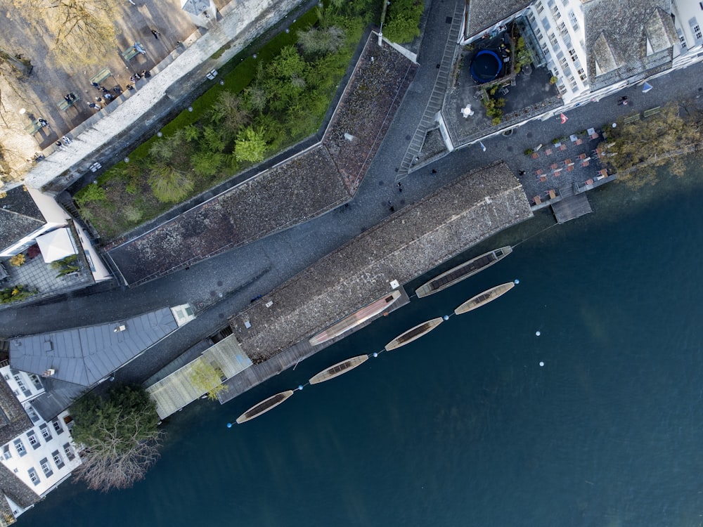 an aerial view of a river and a bridge