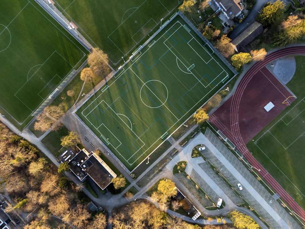 an aerial view of a soccer field in a city