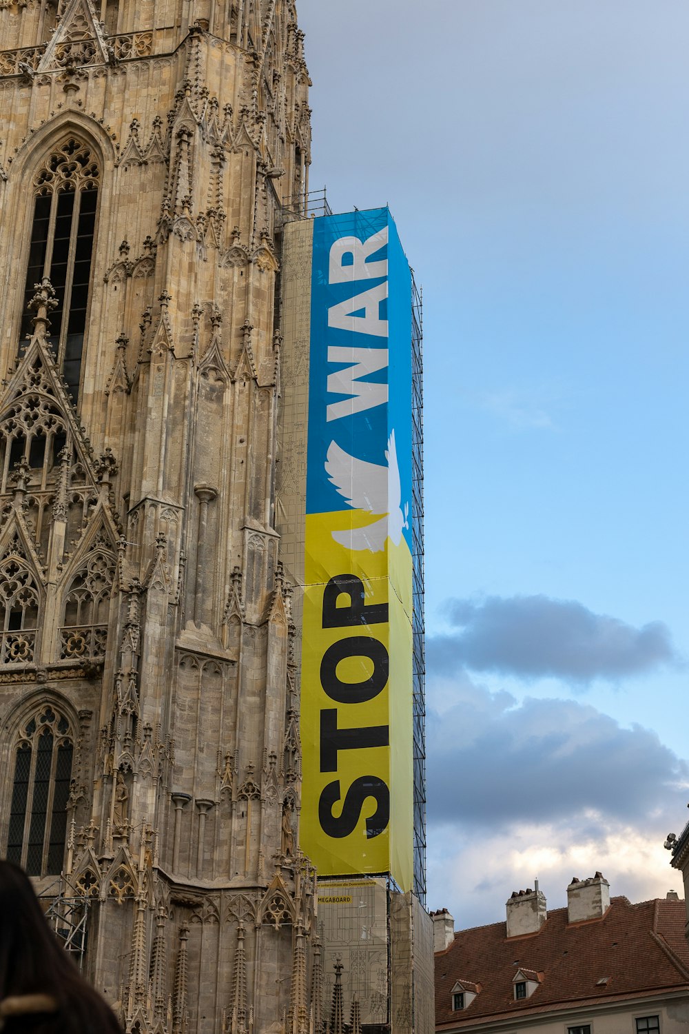 a tall building with a large sign on the side of it