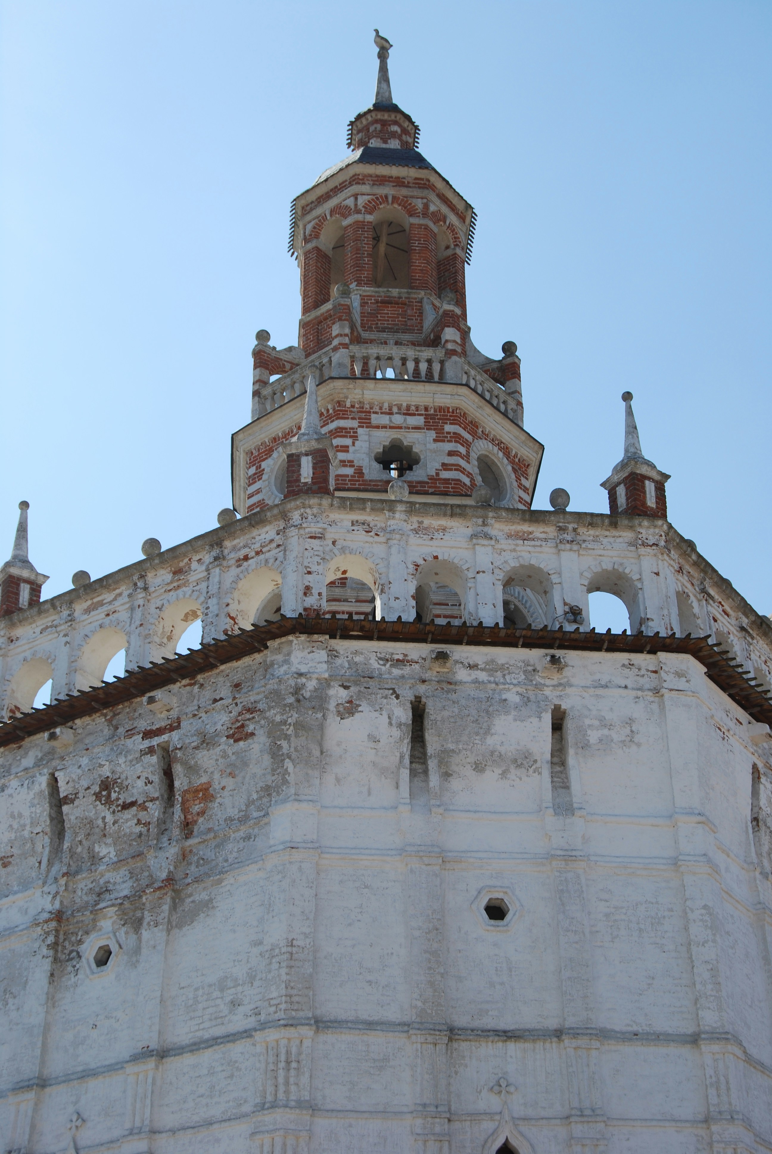 a tall tower with a clock on top of it
