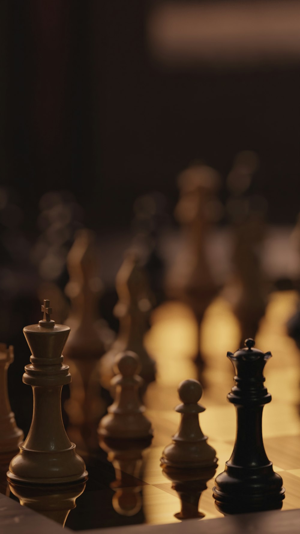 A group of chess pieces sitting on top of a chess board photo