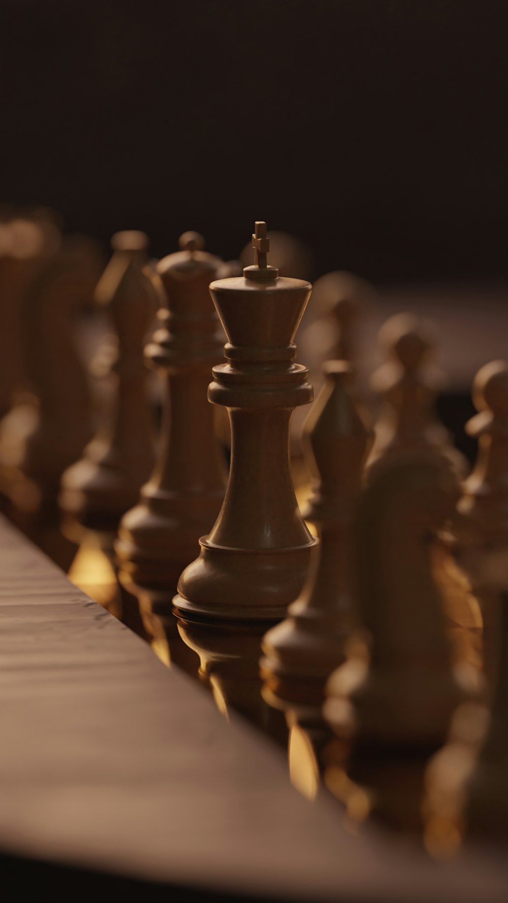 a close up of a chess board with pieces on it