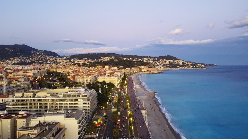 a view of a beach with a city in the background