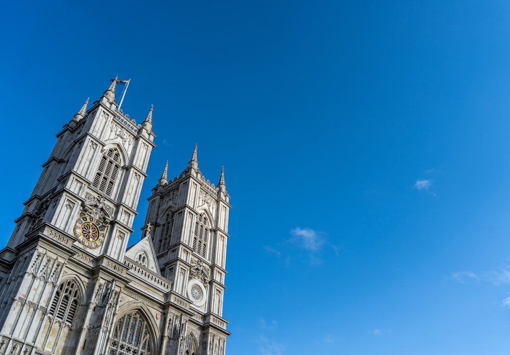 a large cathedral with a clock on the front of it