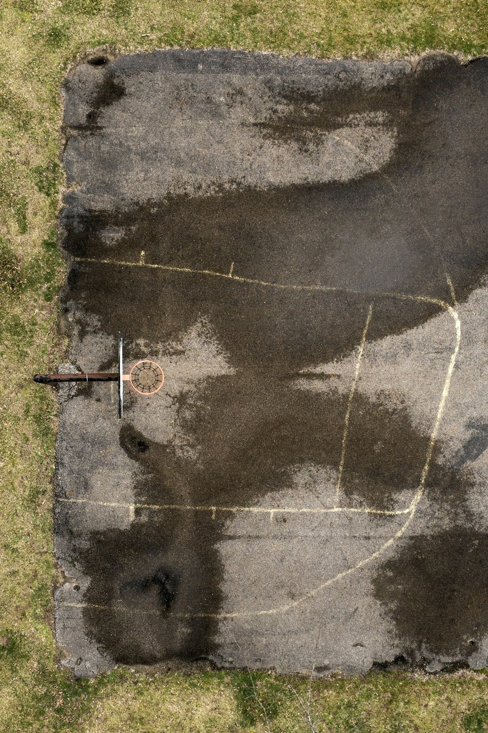 an aerial view of a parking lot with a parking meter