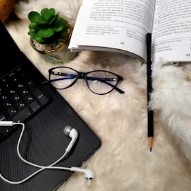 A cozy setup featuring books and publishing tools.