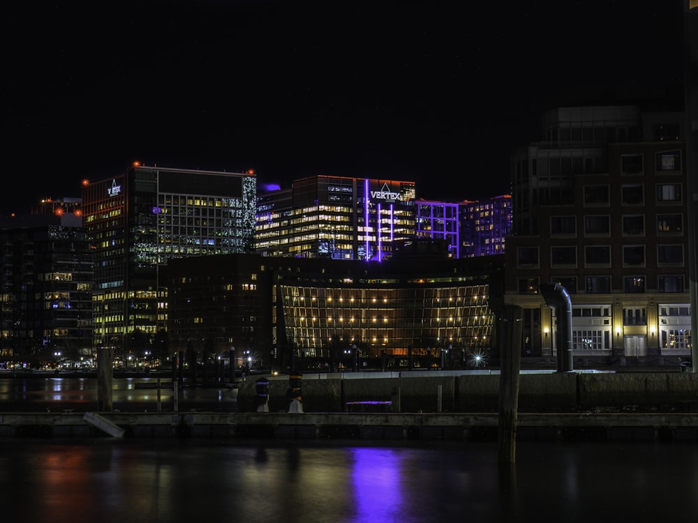 a view of a city at night from across the water