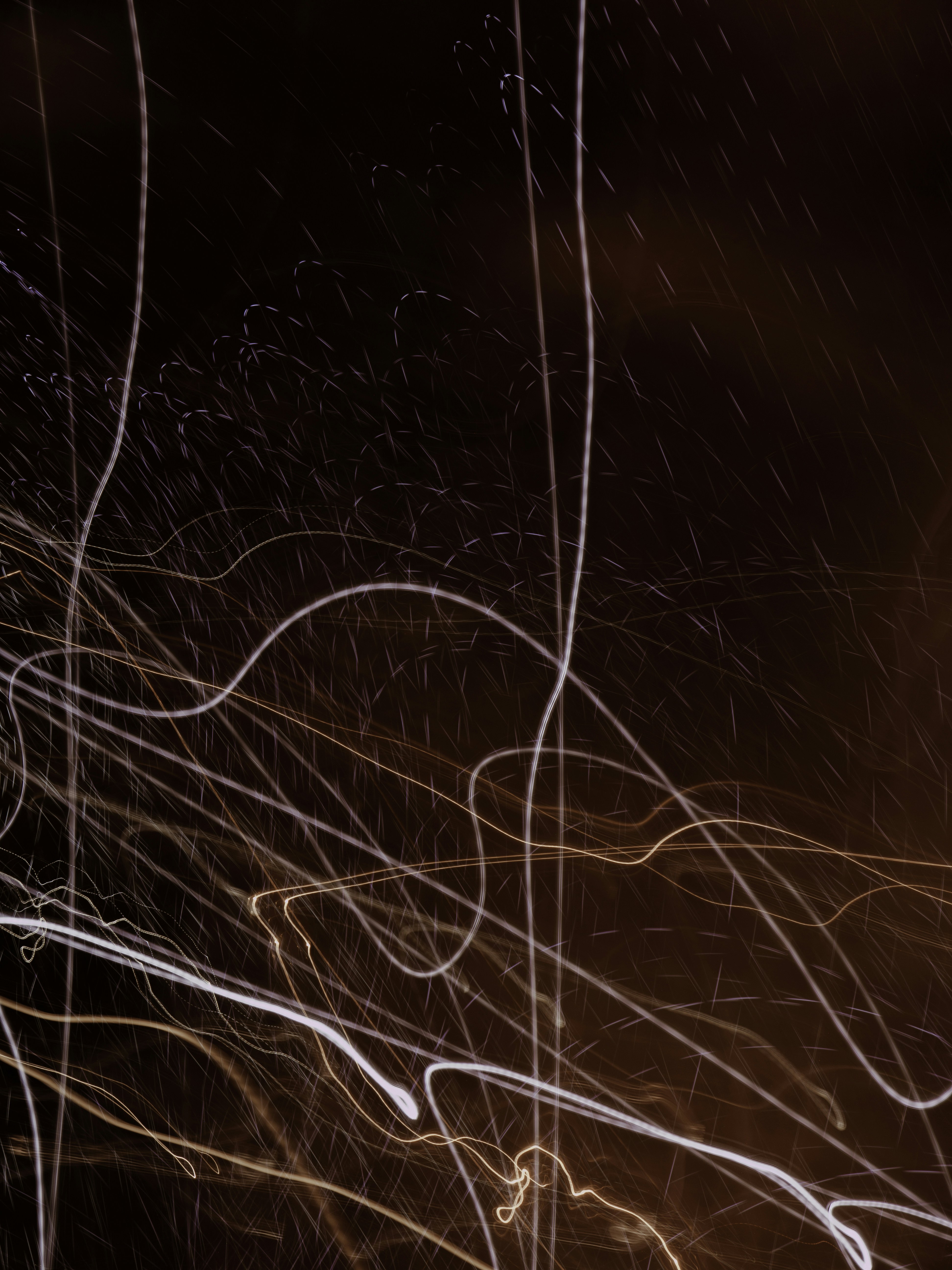 a blurry photo of a clock tower at night